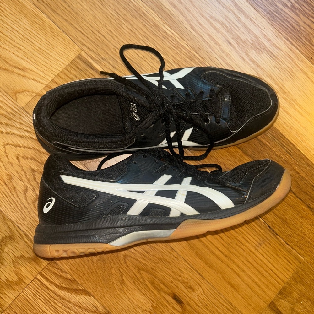 ASICS Gel-Rocket 9 volleyball court shoes. Black and white with tan bottom.